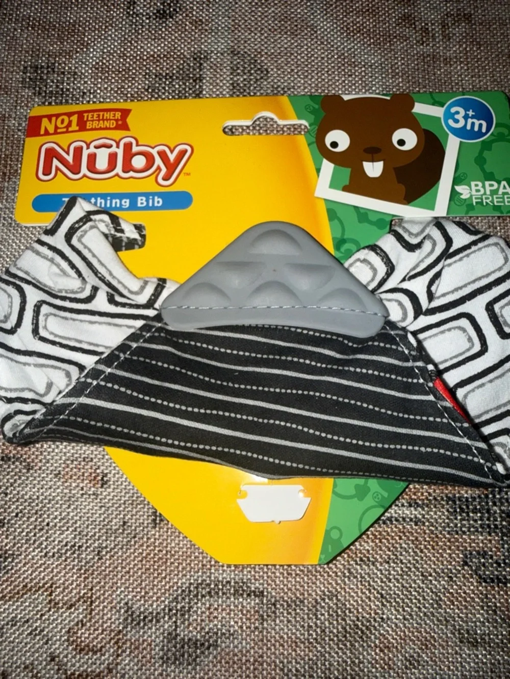 Brand new Nuby Teething Bib in Black & White with Teething Corner
